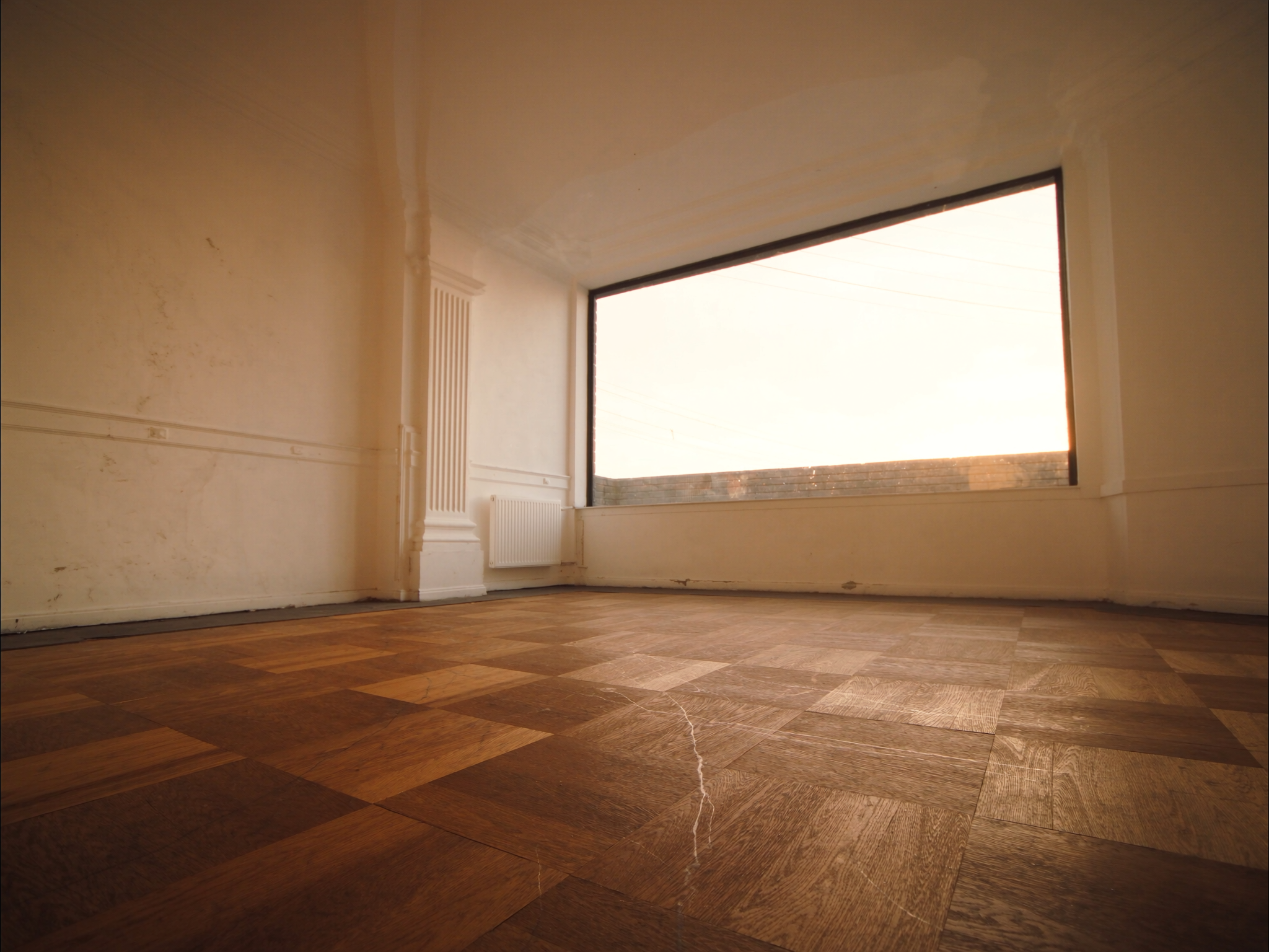 Avant : rénovation parquet ancien à Uccle